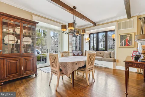 a view of a dining room kitchen and a wooden floor