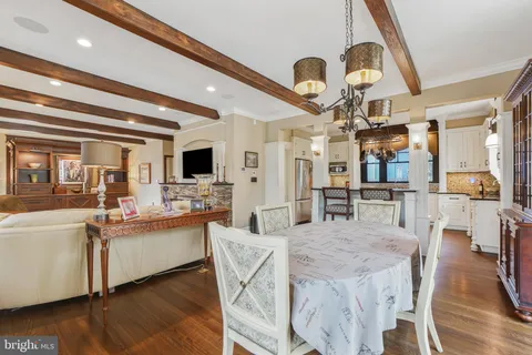 a kitchen with stainless steel appliances granite countertop a stove and a refrigerator