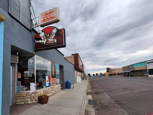 a view of a street with cars