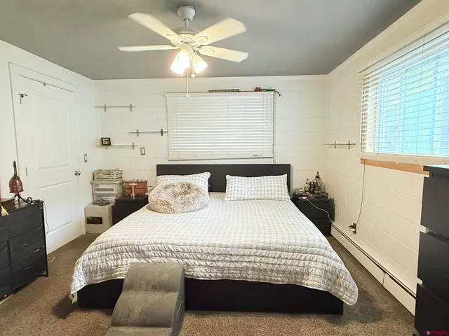 a view of a house with door and outdoor seating