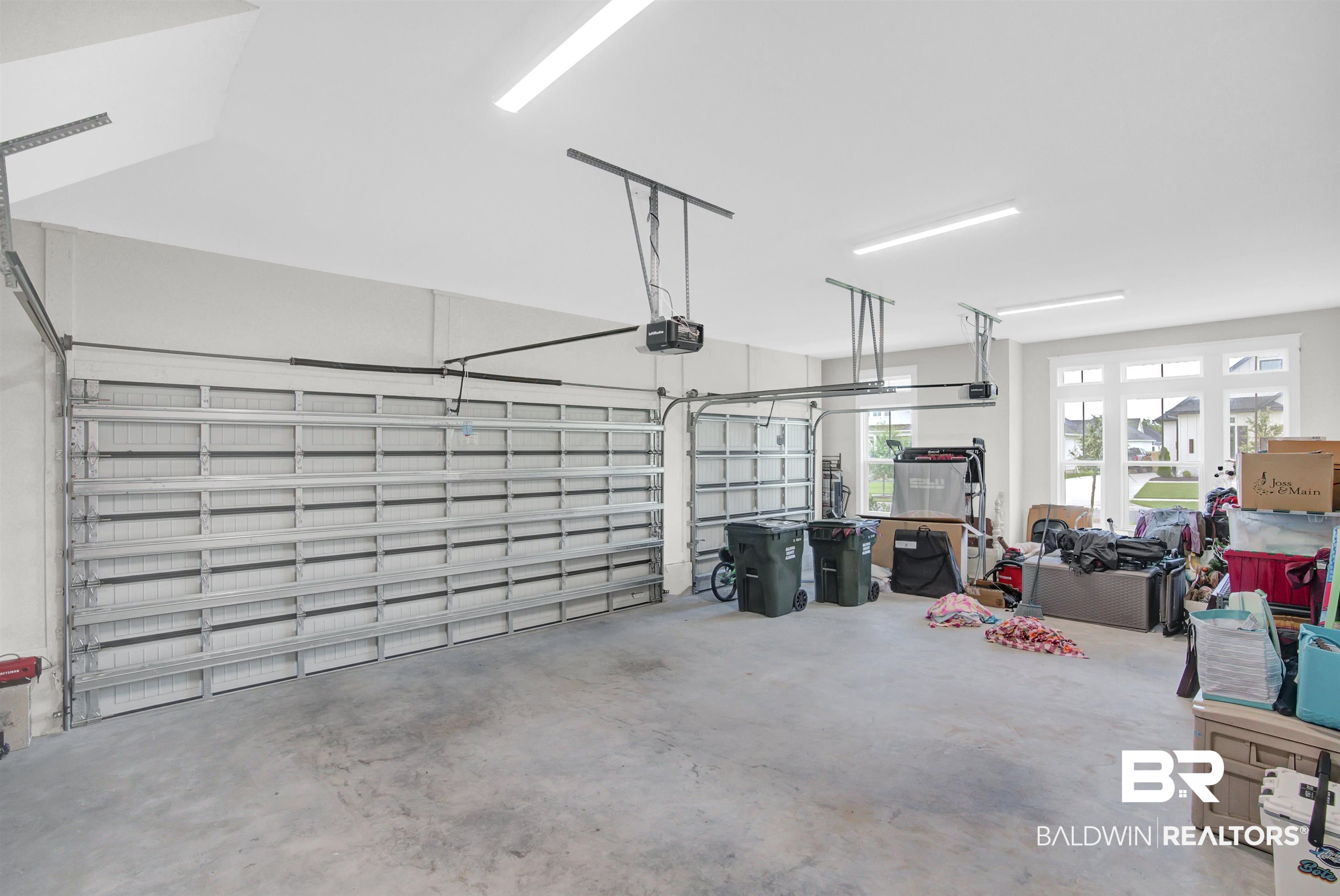 10940 Atrium Avenue Fairhope, AL 36532 - Photo 41 of 43 Garage featuring a garage door opener