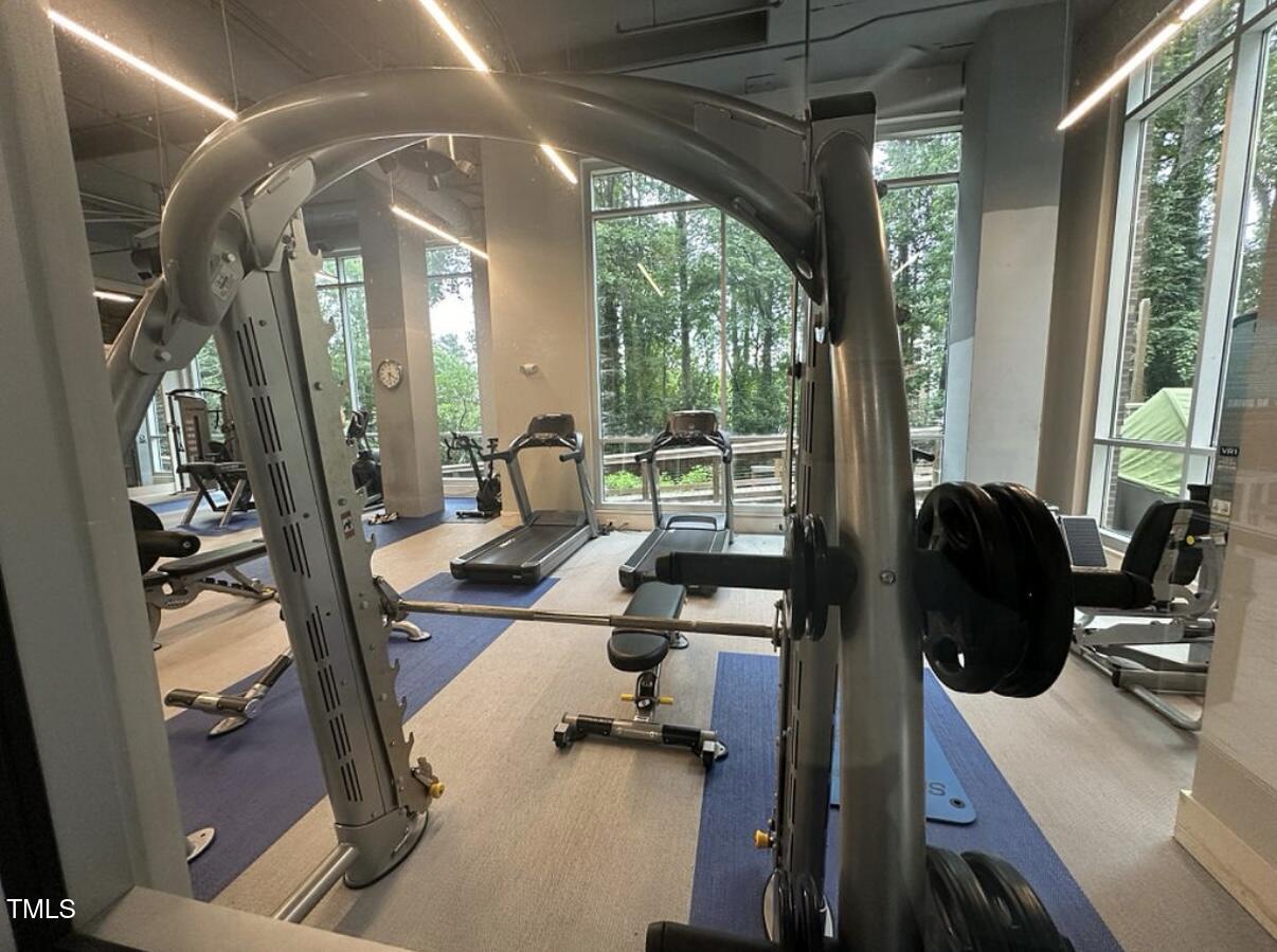 2608 Erwin Road, Unit 403 Durham, NC 27705 - Photo 13 of 15 a view of a livingroom with furniture and large windows