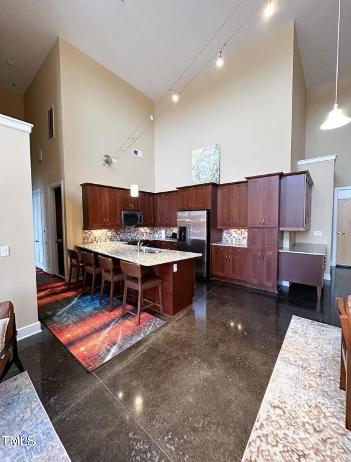 2608 Erwin Road, Unit 403 Durham, NC 27705 - Photo 2 of 15 a living room with furniture and a table