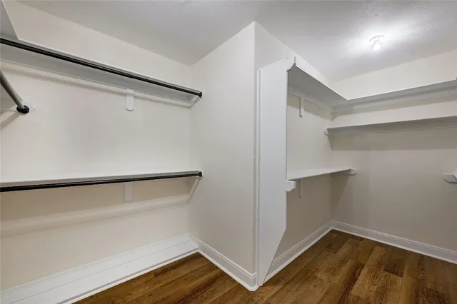 a view of an empty walk in closet