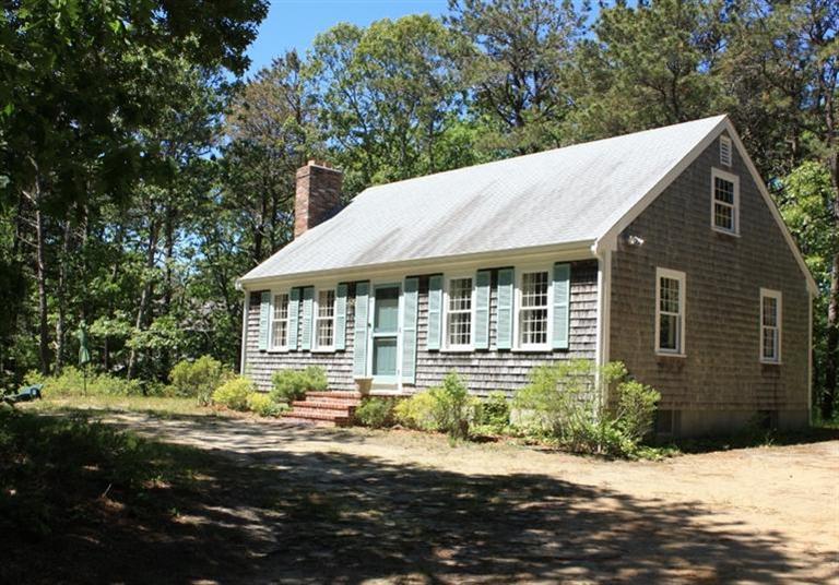 75 Herring River Road Wellfleet, MA 02667 - Photo 4 of 15 a front view of a house with a yard
