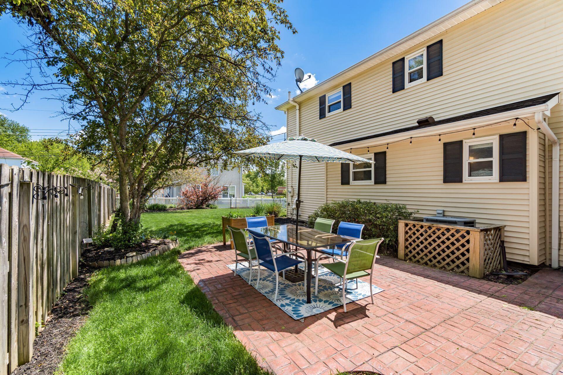 1480 Windham Road Columbus, OH 43220 - Photo 67 of 79 View of the exterior rear of the home and patio