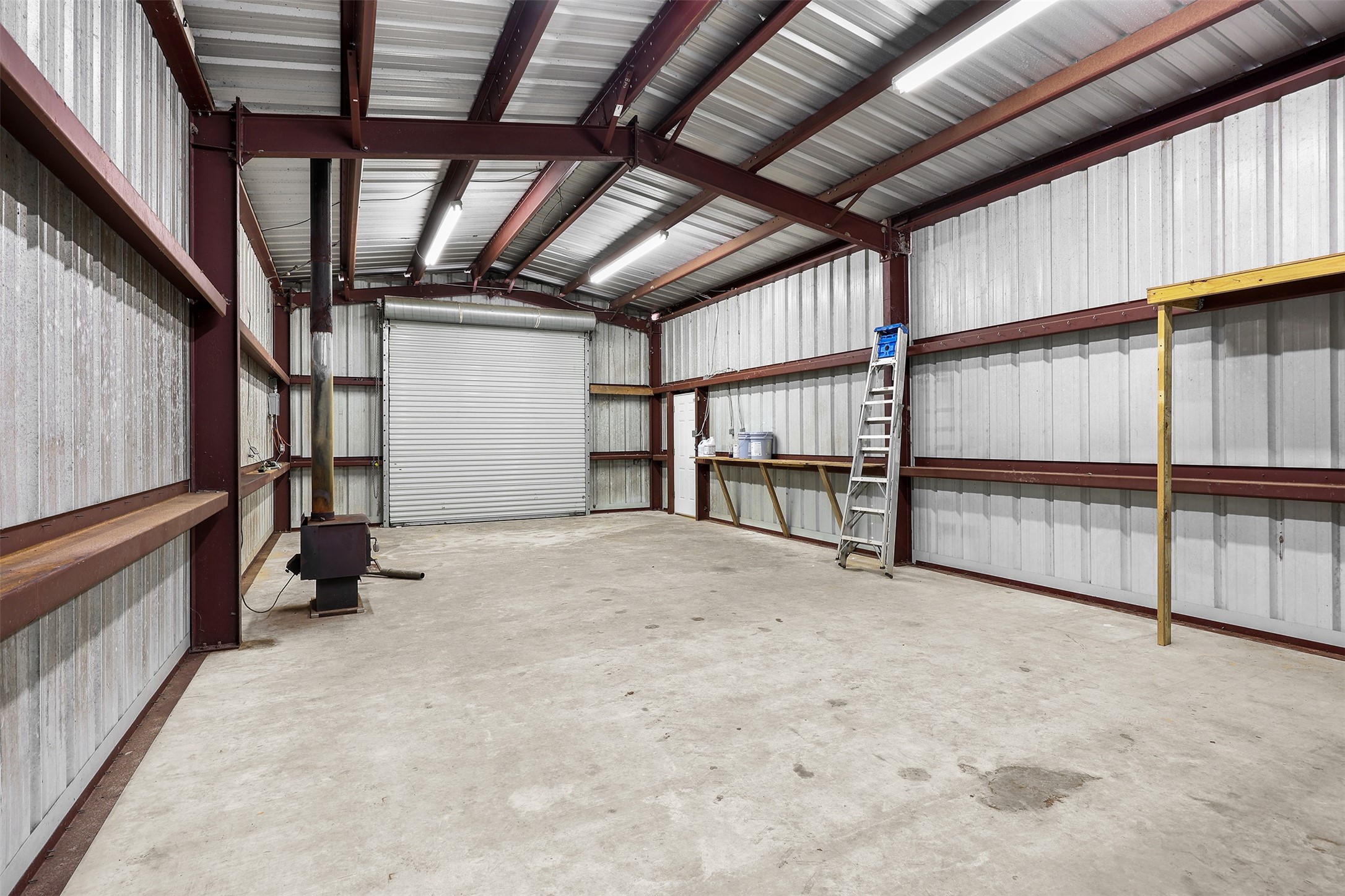 1635 Wallisville-Turtle Bayou Road Wallisville, TX 77597 - Photo 14 of 46 a view of an empty room with wooden walls