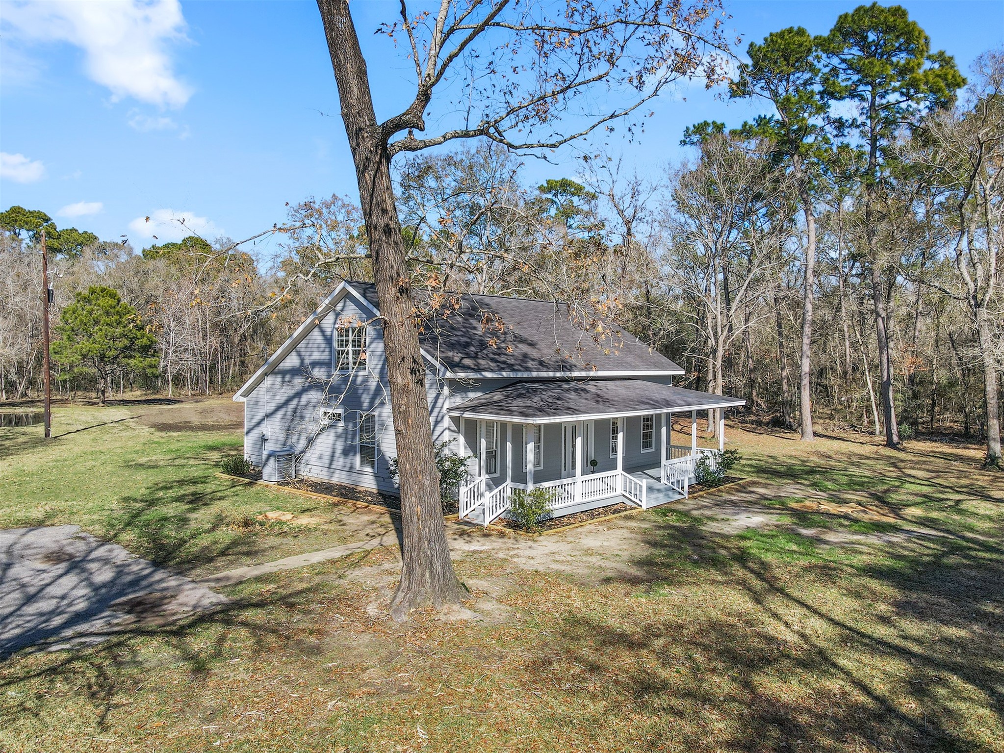 1635 Wallisville-Turtle Bayou Road Wallisville, TX 77597 - Photo 17 of 46 a view of a house with a yard