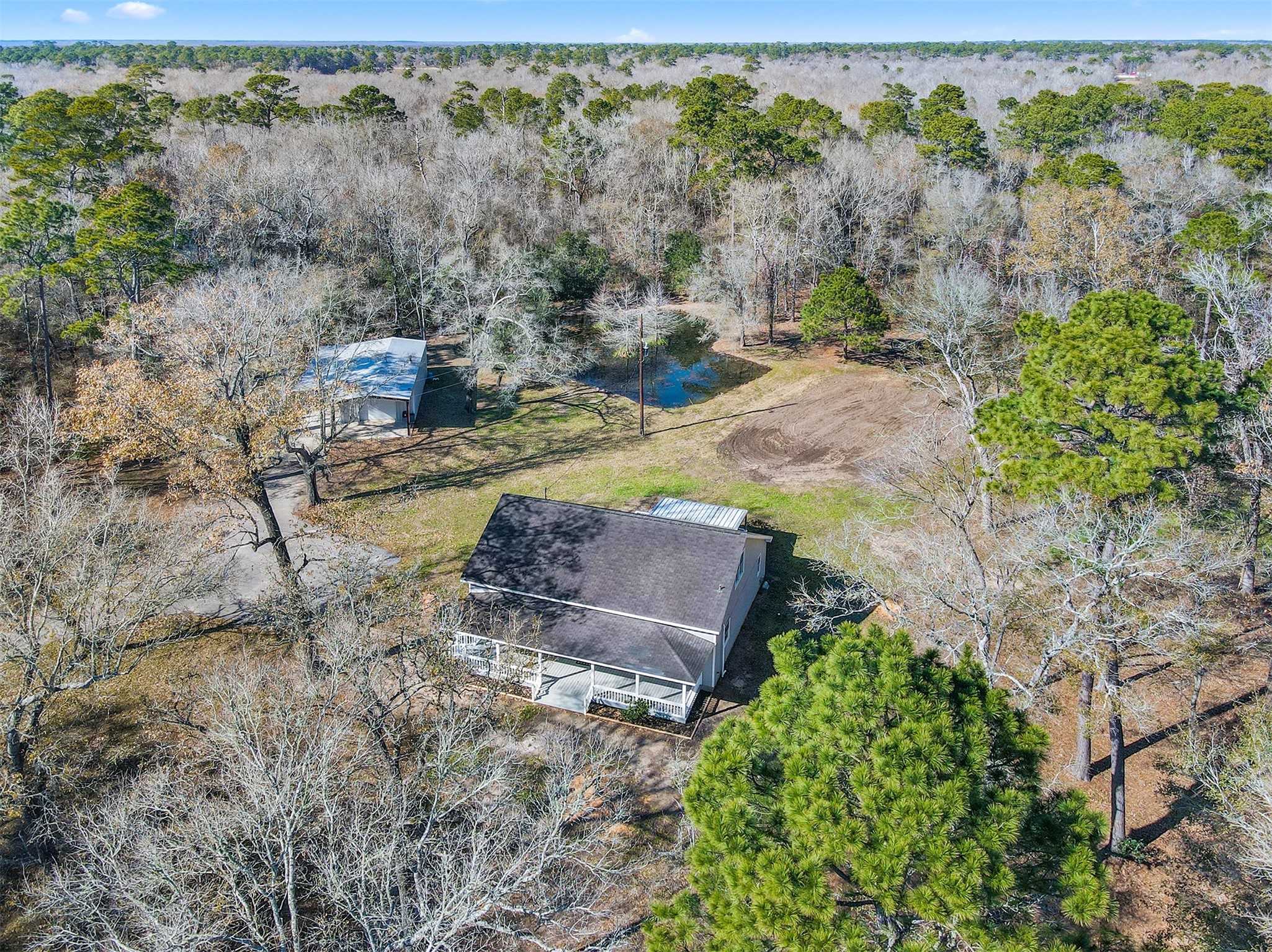1635 Wallisville-Turtle Bayou Road Wallisville, TX 77597 - Photo 18 of 46 an aerial view of a house with a yard