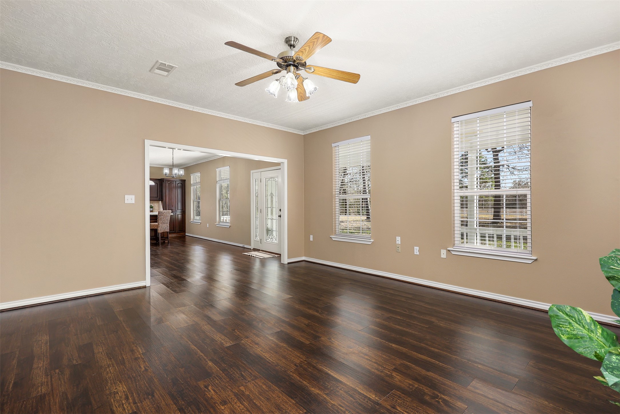 1635 Wallisville-Turtle Bayou Road Wallisville, TX 77597 - Photo 22 of 46 a view of an empty room with wooden floor and a window