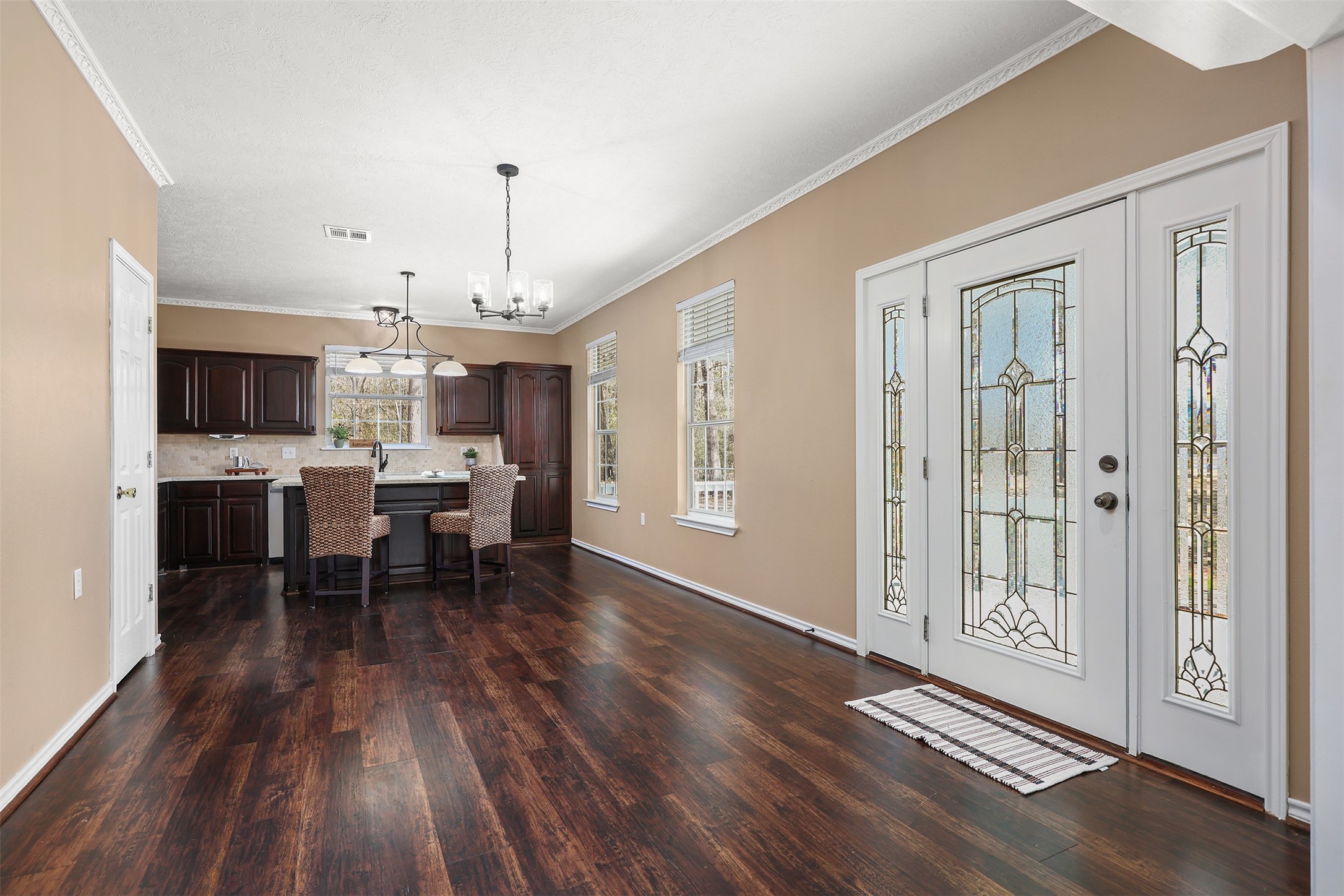1635 Wallisville-Turtle Bayou Road Wallisville, TX 77597 - Photo 24 of 46 a view of a dining room with furniture window and wooden floor