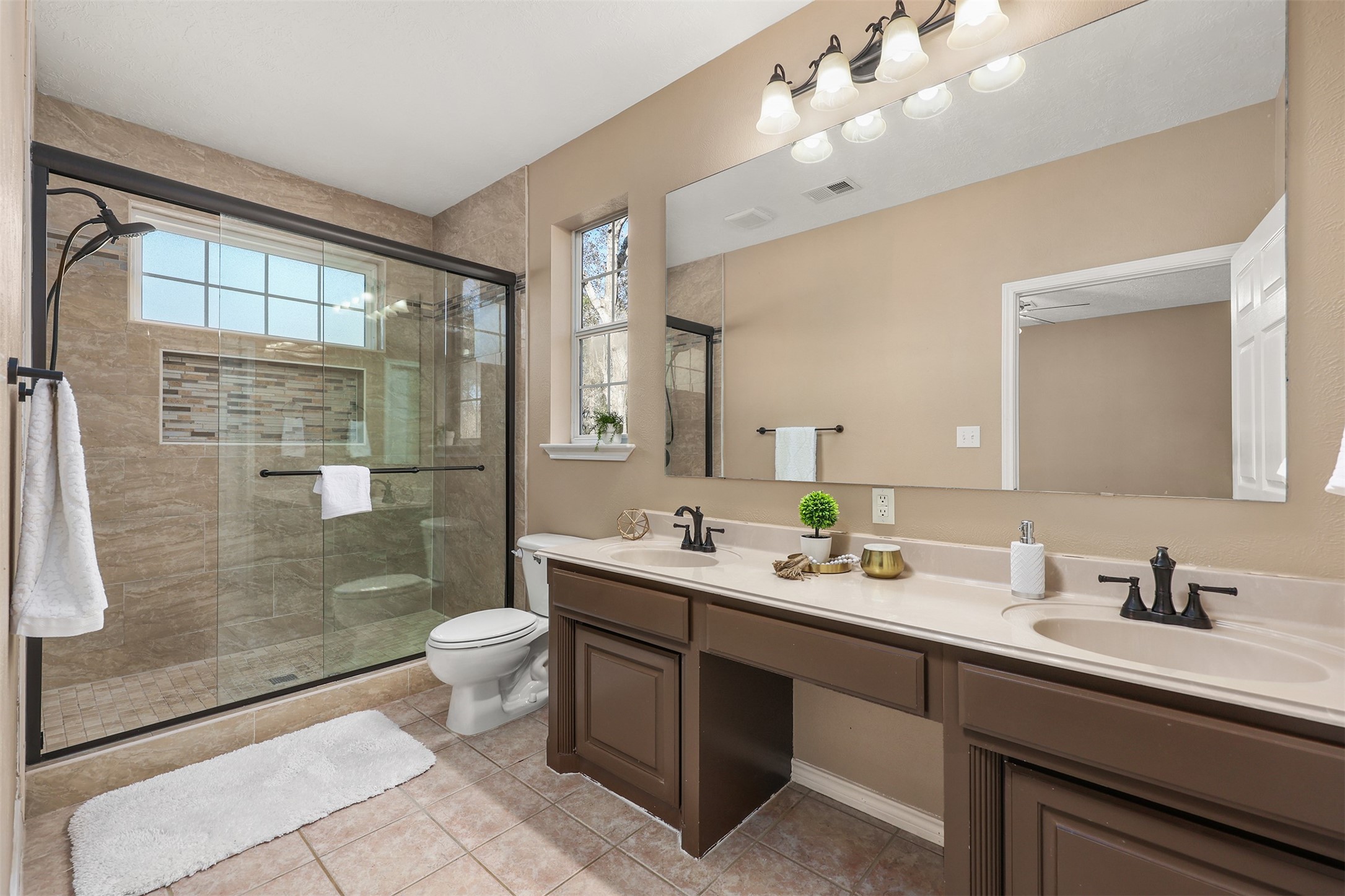 1635 Wallisville-Turtle Bayou Road Wallisville, TX 77597 - Photo 29 of 46 a bathroom with a sink shower and a toilet