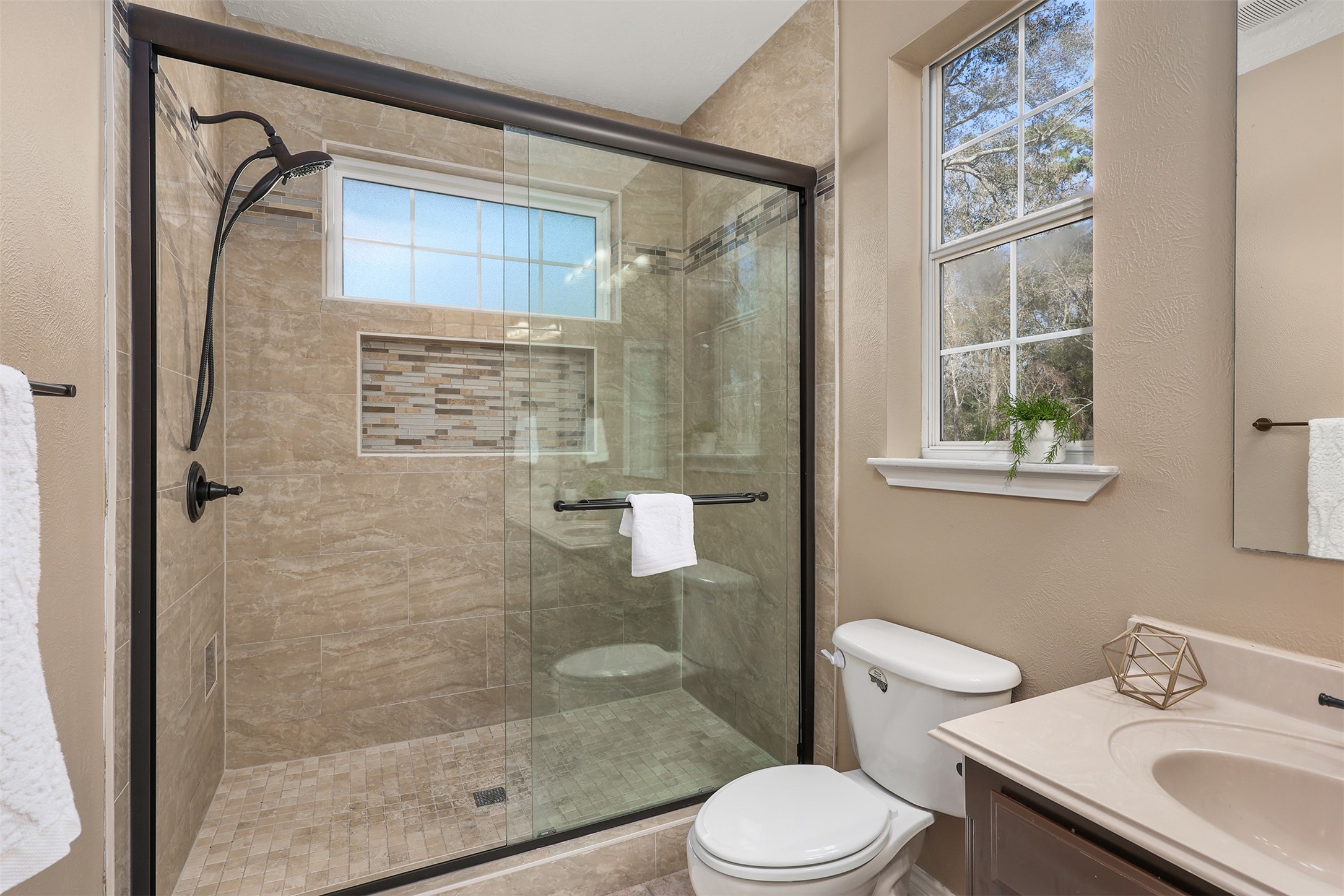 1635 Wallisville-Turtle Bayou Road Wallisville, TX 77597 - Photo 30 of 46 a bathroom with a shower a toilet and a sink