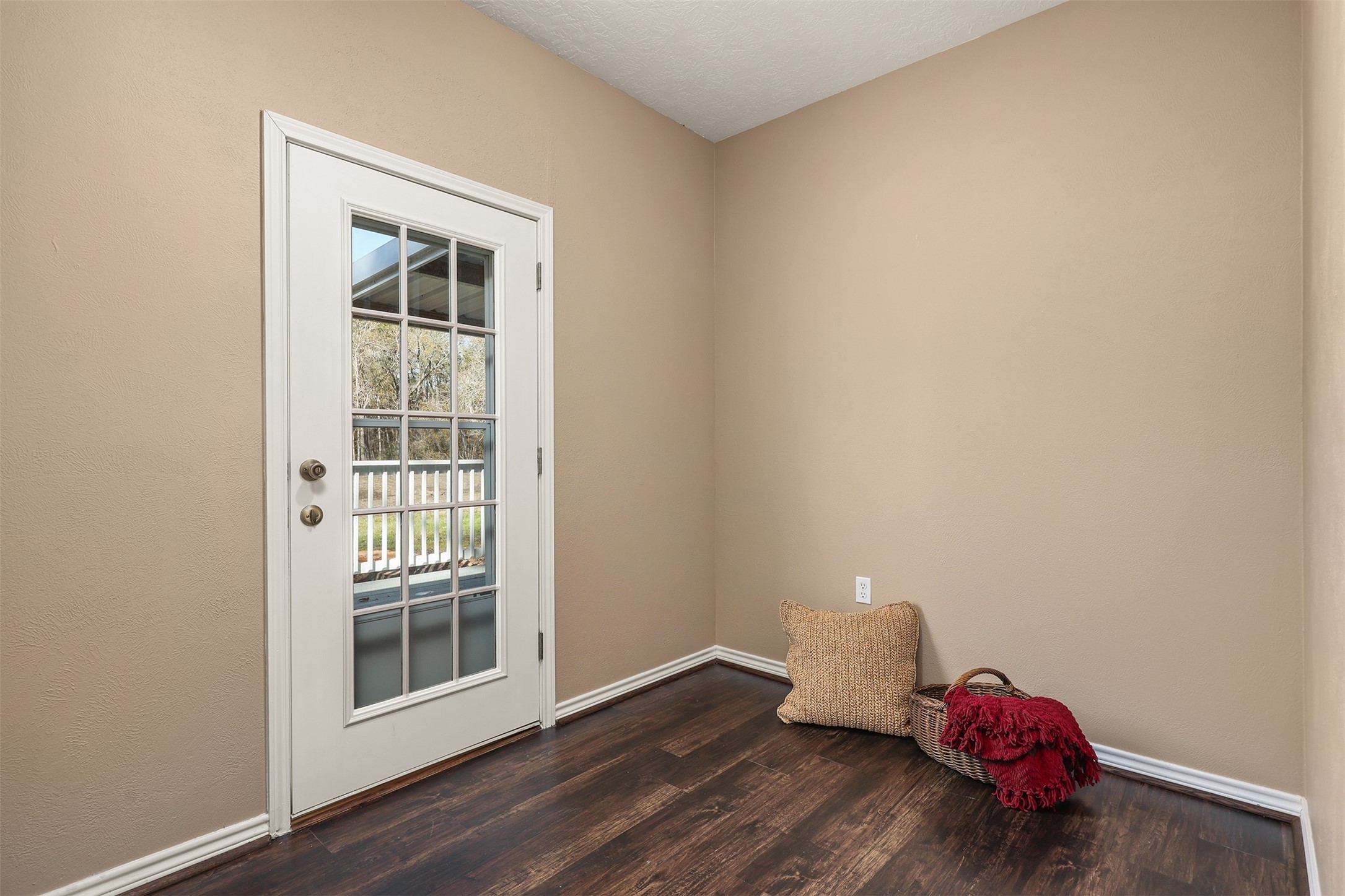 1635 Wallisville-Turtle Bayou Road Wallisville, TX 77597 - Photo 34 of 46 an empty room with wooden floor and windows
