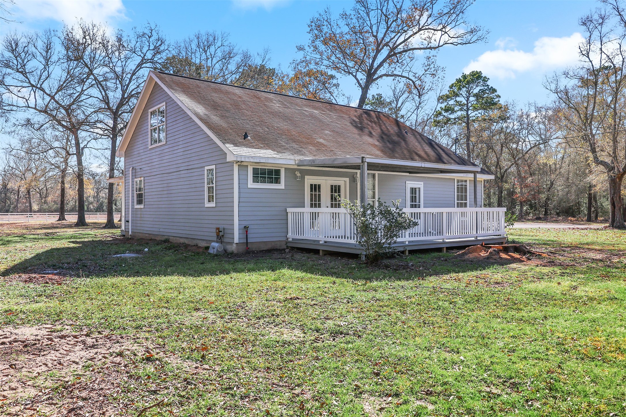 1635 Wallisville-Turtle Bayou Road Wallisville, TX 77597 - Photo 43 of 46 a view of a house with a yard and large trees