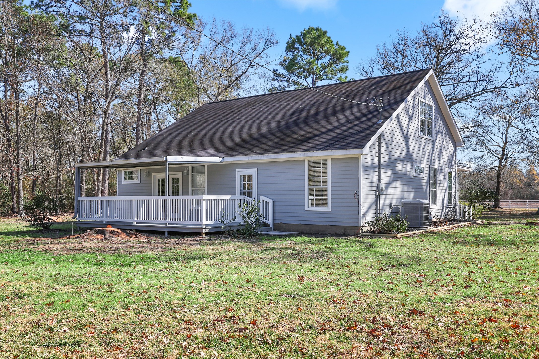 1635 Wallisville-Turtle Bayou Road Wallisville, TX 77597 - Photo 44 of 46 a view of a house with a yard