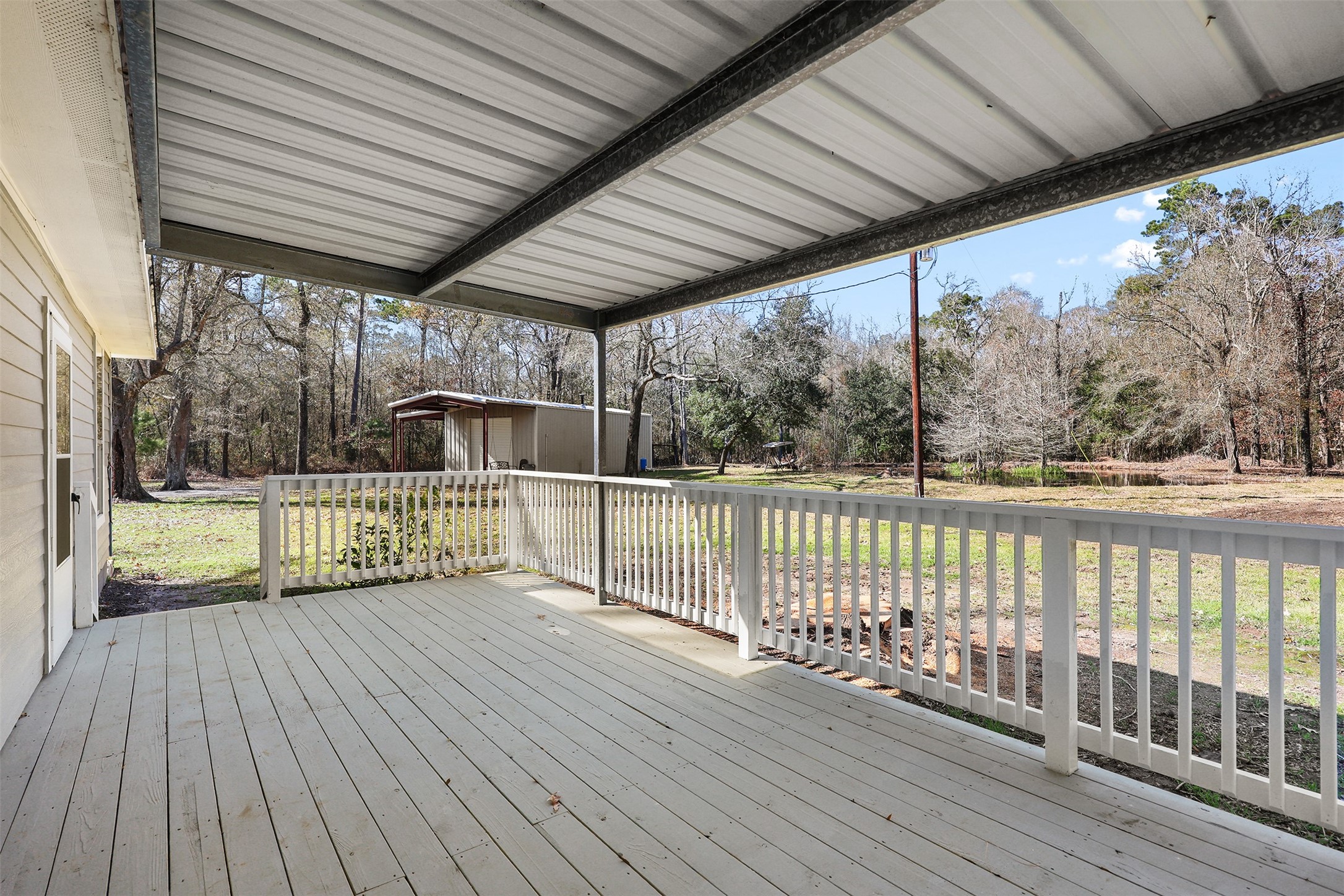 1635 Wallisville-Turtle Bayou Road Wallisville, TX 77597 - Photo 7 of 46 a view of a roof deck
