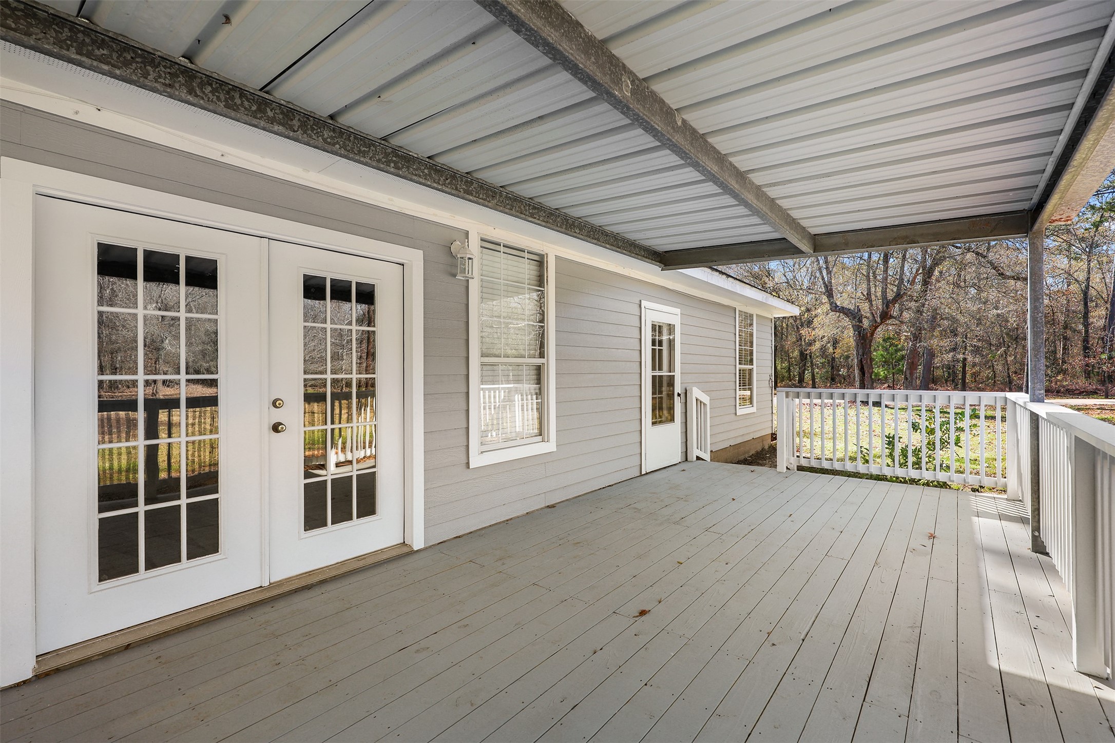 1635 Wallisville-Turtle Bayou Road Wallisville, TX 77597 - Photo 8 of 46 a view of porch with wooden floor