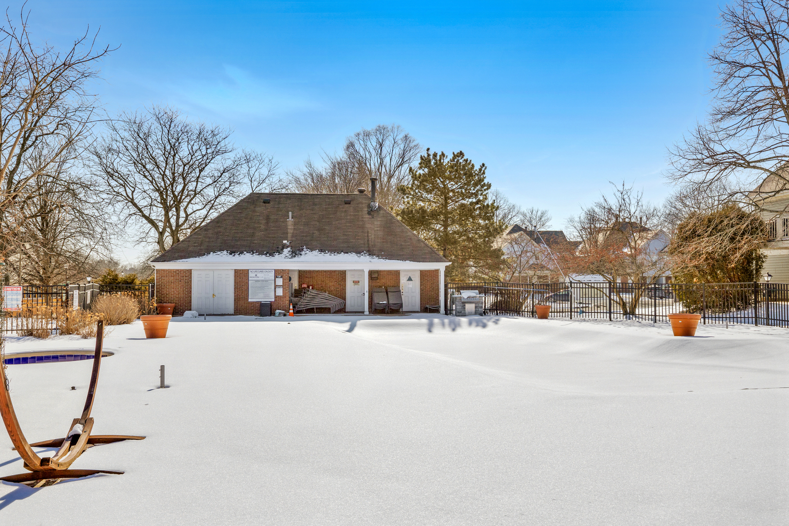 1600 Brittany Court, Unit C2 Wheeling, IL 60090 - Photo 27 of 27 a view of a house with a snow in the yard
