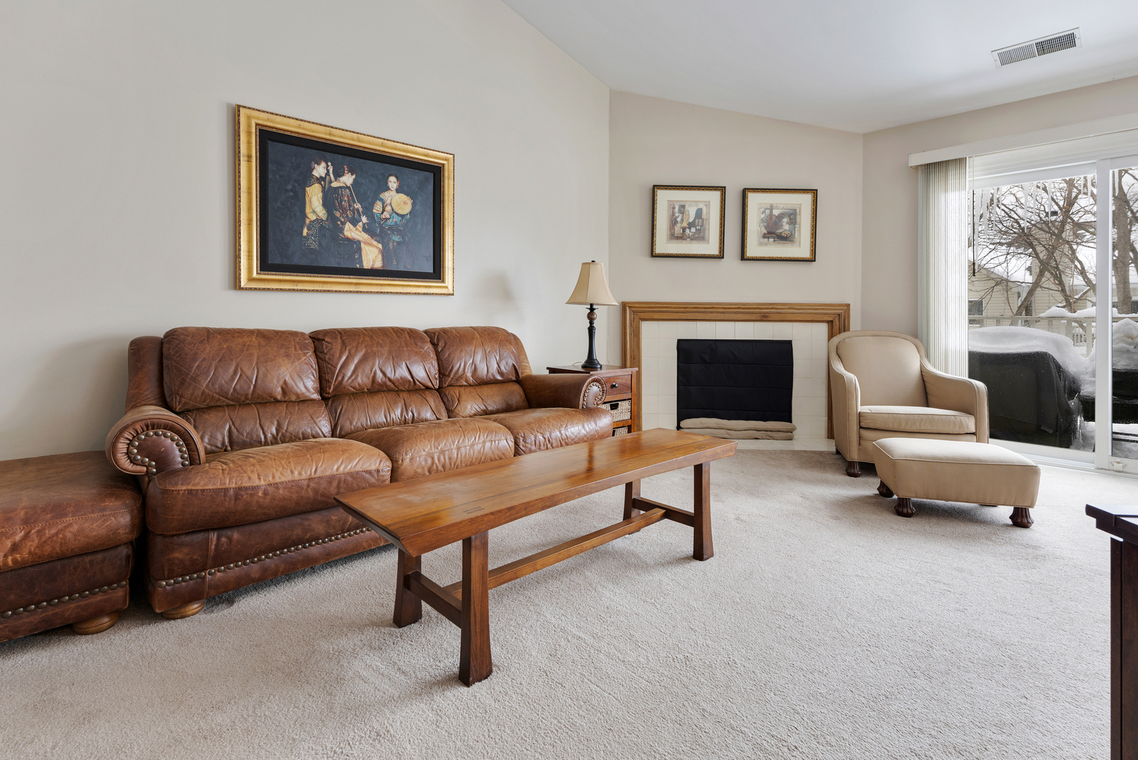 1600 Brittany Court, Unit C2 Wheeling, IL 60090 - Photo 5 of 27 a living room with furniture and a fireplace