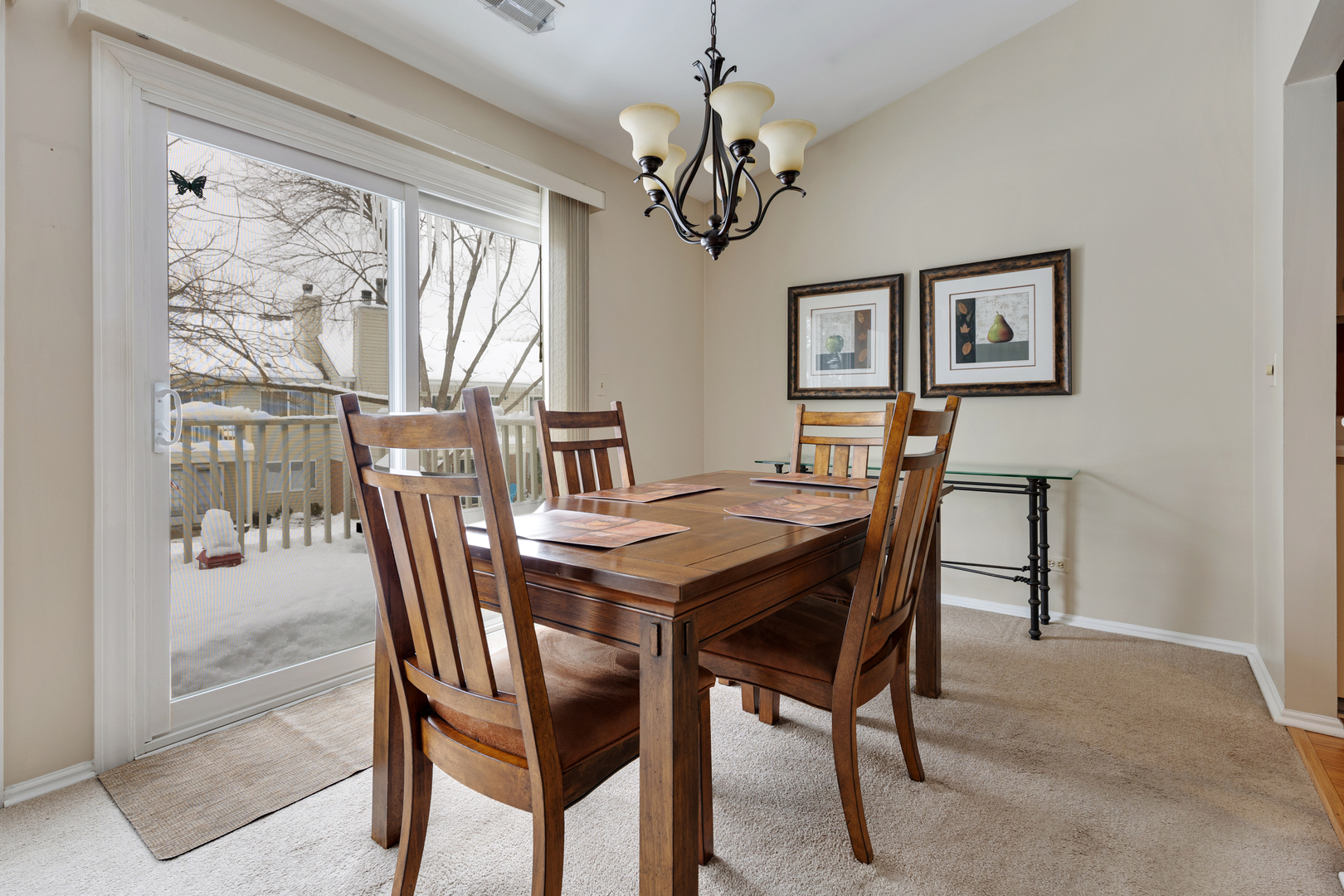 1600 Brittany Court, Unit C2 Wheeling, IL 60090 - Photo 9 of 27 a view of a dining room with furniture window and outside view
