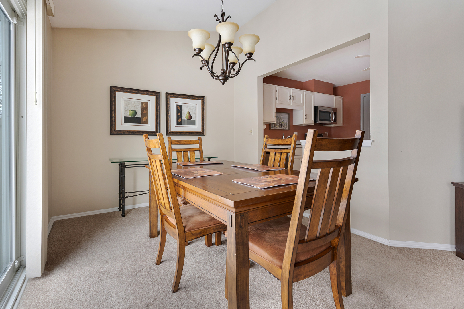 1600 Brittany Court, Unit C2 Wheeling, IL 60090 - Photo 10 of 27 a view of a dining room with furniture