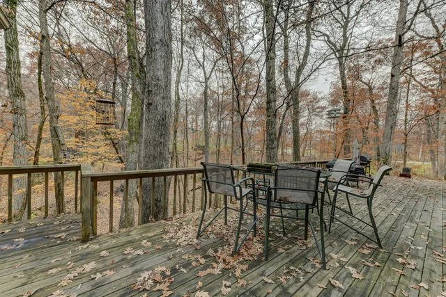 a view of a chairs and table on the wooden floor