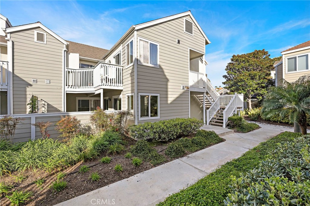 34104 Selva Road, Unit 358 Dana Point, CA 92629 - Photo 1 of 1 a front view of a house with a yard