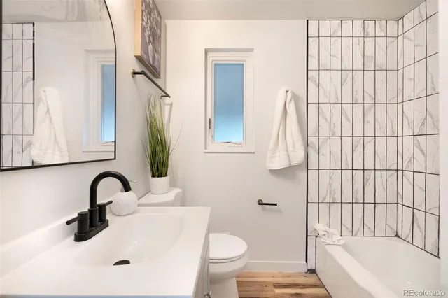 a bathroom with a sink and a toilet