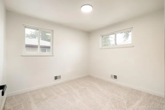 an empty room with a window