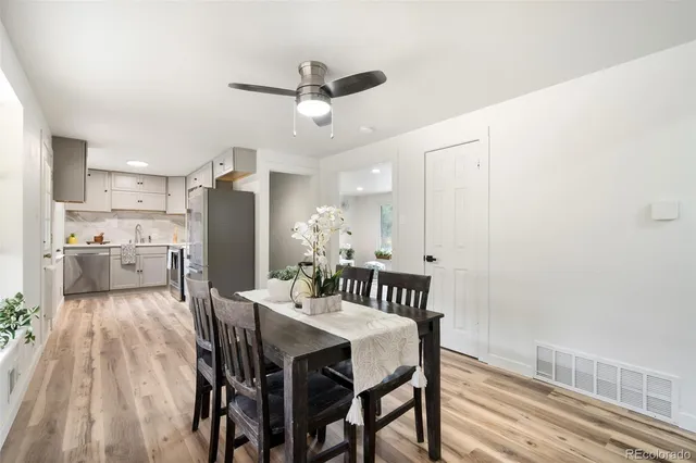 a view of a dining room with furniture