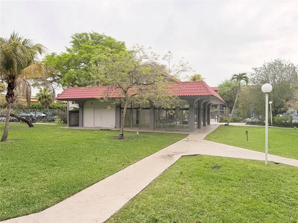 a view of outdoor space yard and swimming pool