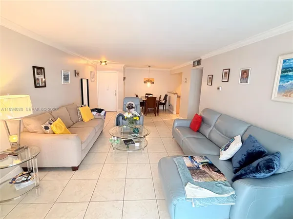 a living room with furniture and a couch