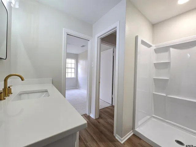 a view of an empty walk in closet