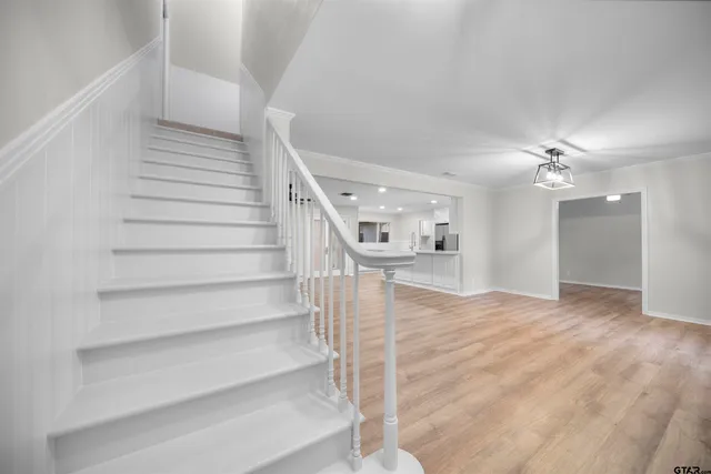 a bathroom with a sink a toilet and a bathtub
