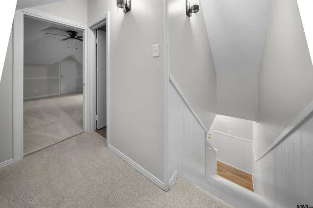 a view of a patio with a yard