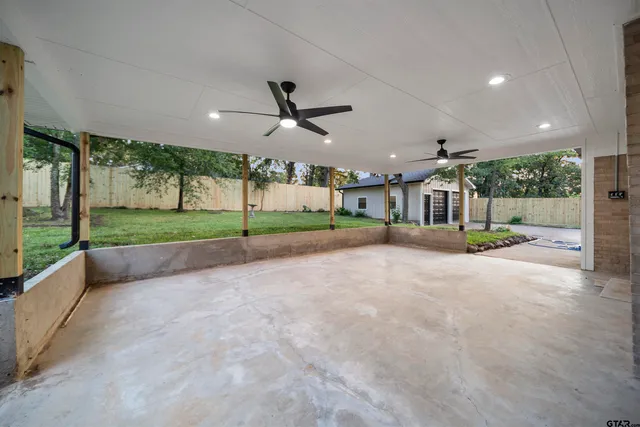 a view of a road and porch