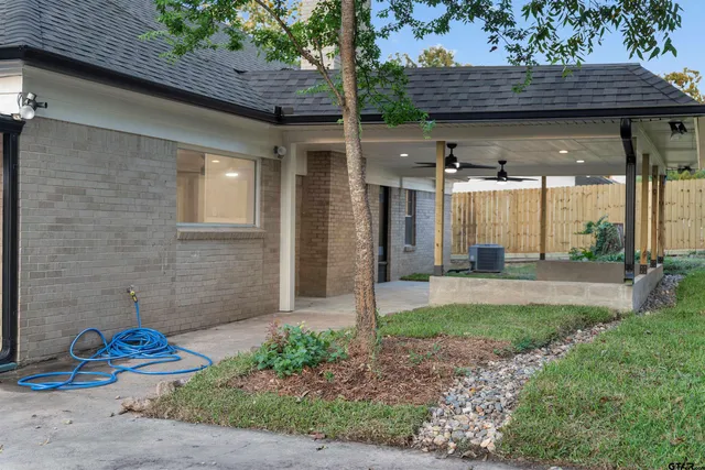 a view of backyard with green space