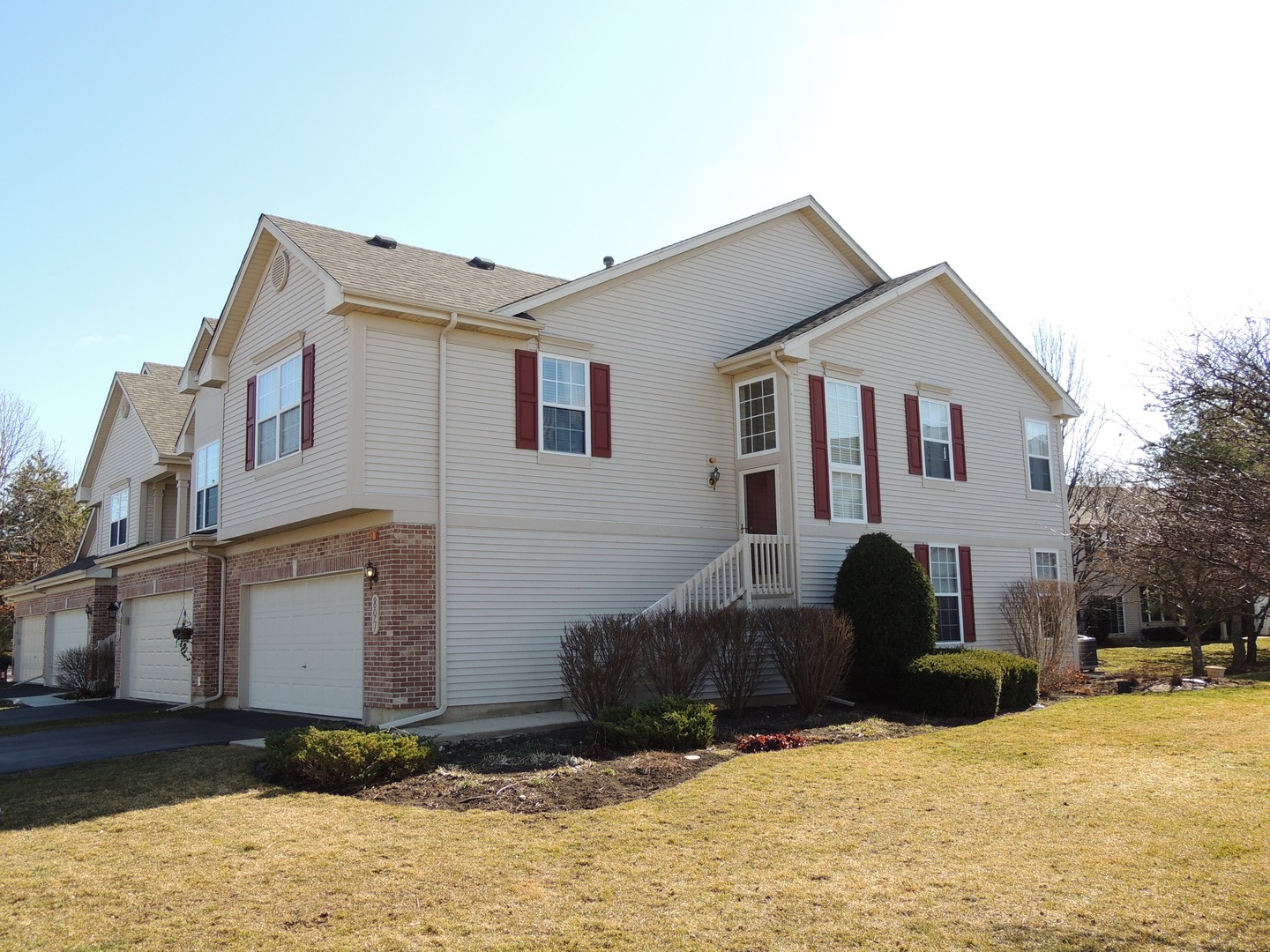 897 Riding Lane St. Charles, IL 60174 - Photo 1 of 1 a view of a house with a yard covered in snow