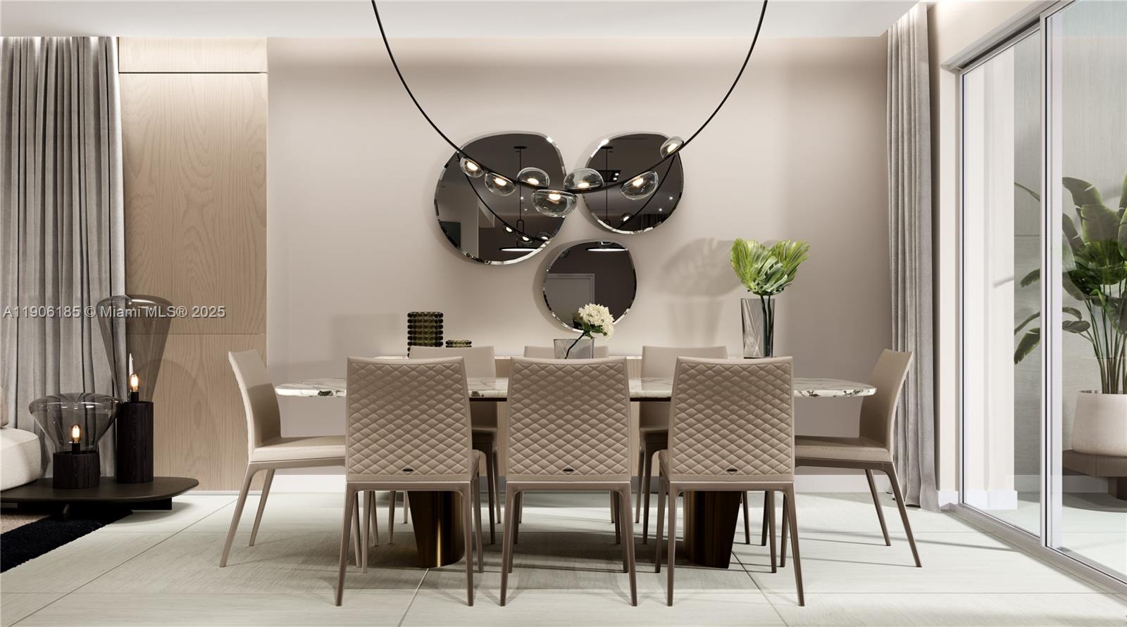 3944 194th Trail Sunny Isles Beach, FL 33160 - Photo 18 of 20 a view of a dining room with furniture and chandelier