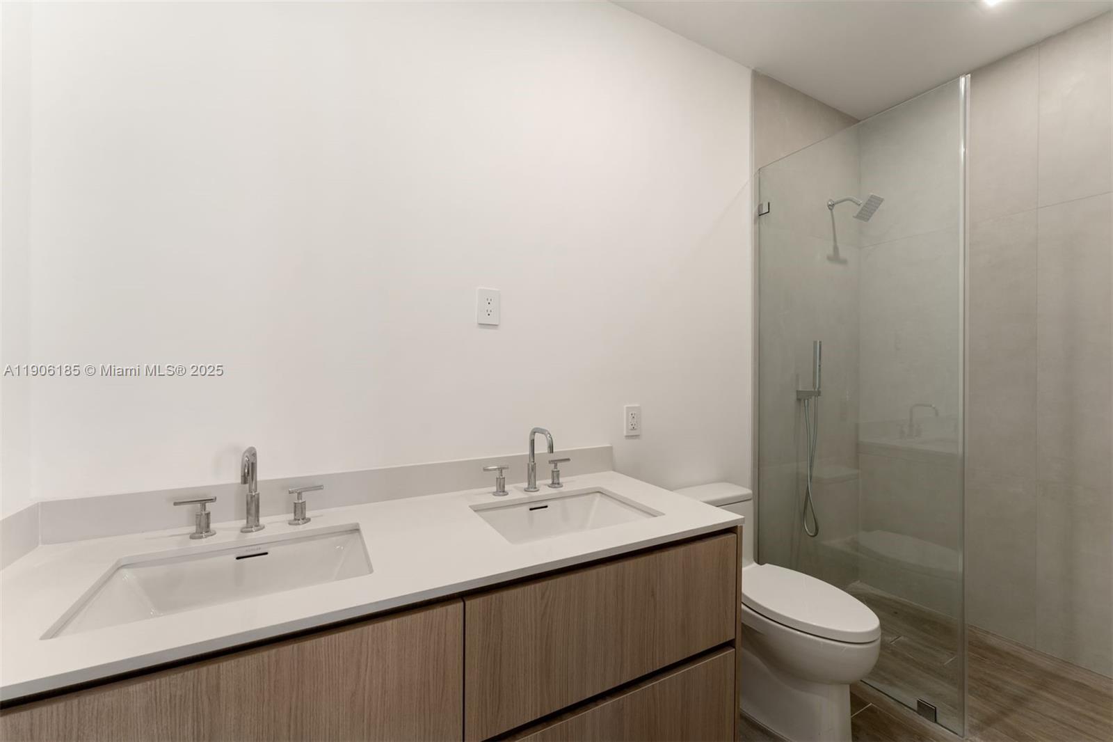 3944 194th Trail Sunny Isles Beach, FL 33160 - Photo 8 of 20 a bathroom with a sink toilet and a mirror