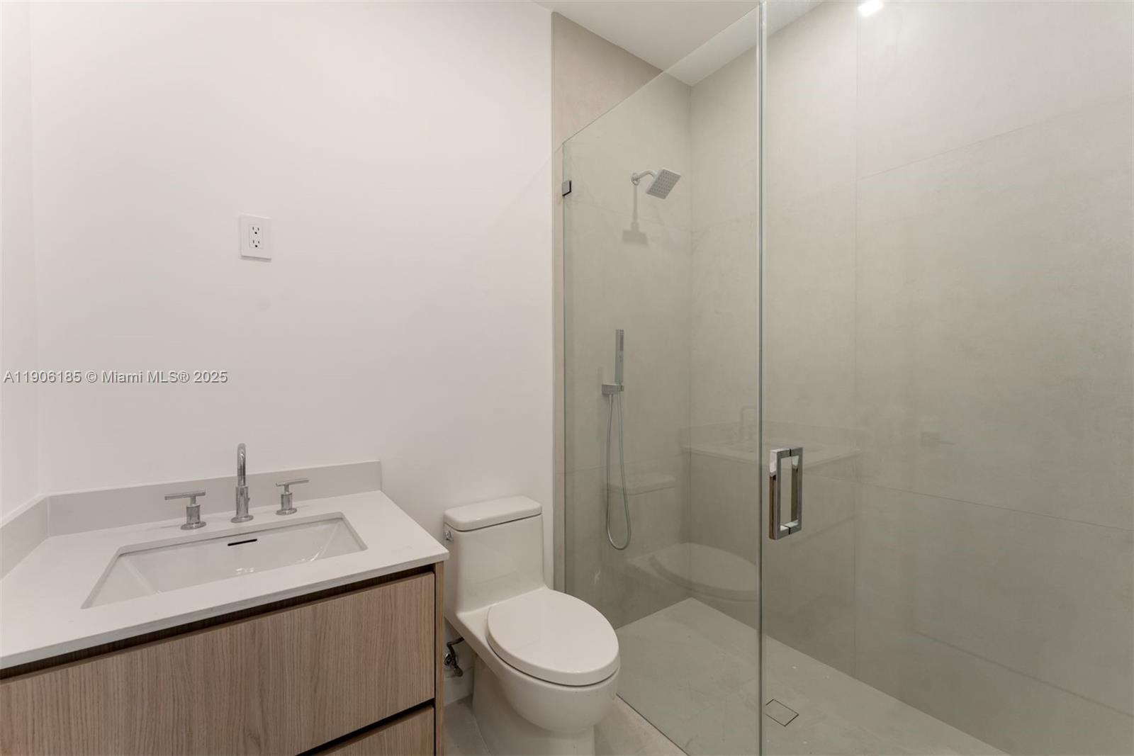3944 194th Trail Sunny Isles Beach, FL 33160 - Photo 9 of 20 a bathroom with a sink toilet and shower