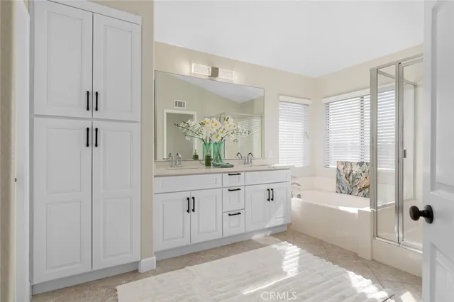 a bathroom with a sink and a bathtub