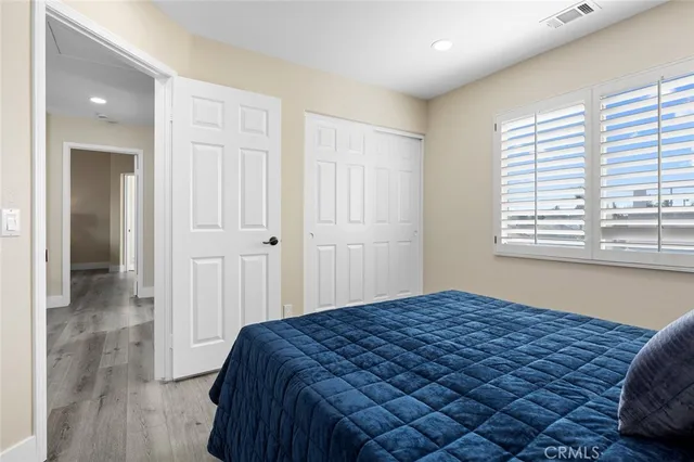 a bathroom with a double vanity sink mirror and shower