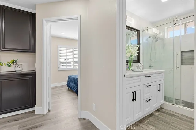 a work room with furniture and a window