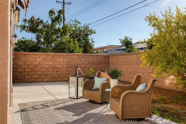 an aerial view of house with yard swimming pool and outdoor seating