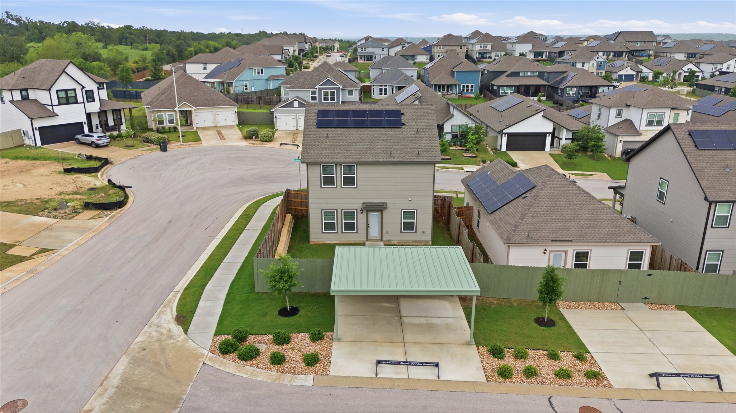 9320 Gladsome Path Manor, TX 78653 - Photo 31 of 34 an aerial view of a house with a garden