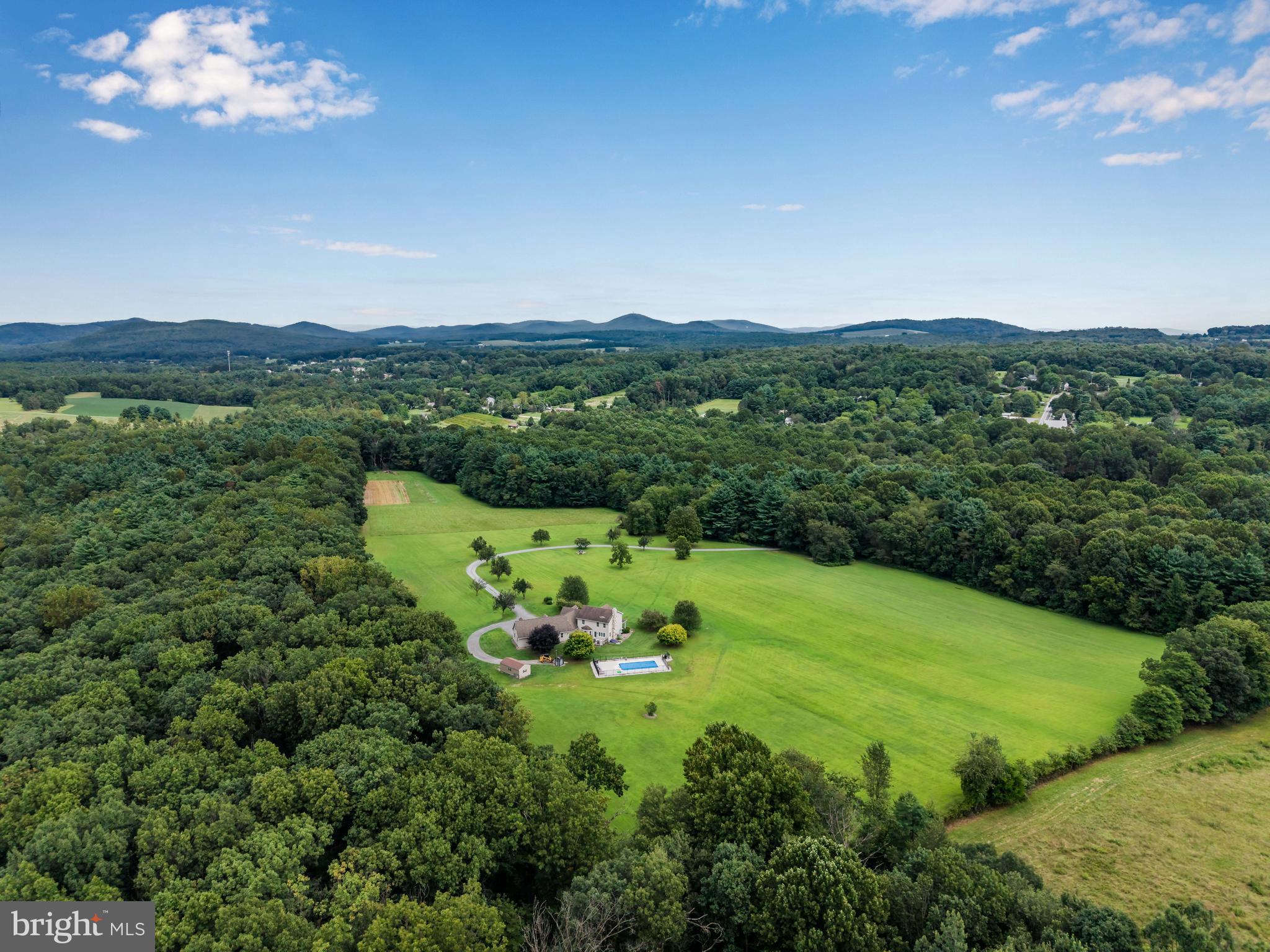 392 Peach Glen Road Gardners, PA 17324 - Photo 12 of 72 a view of a lake with a mountain in the back