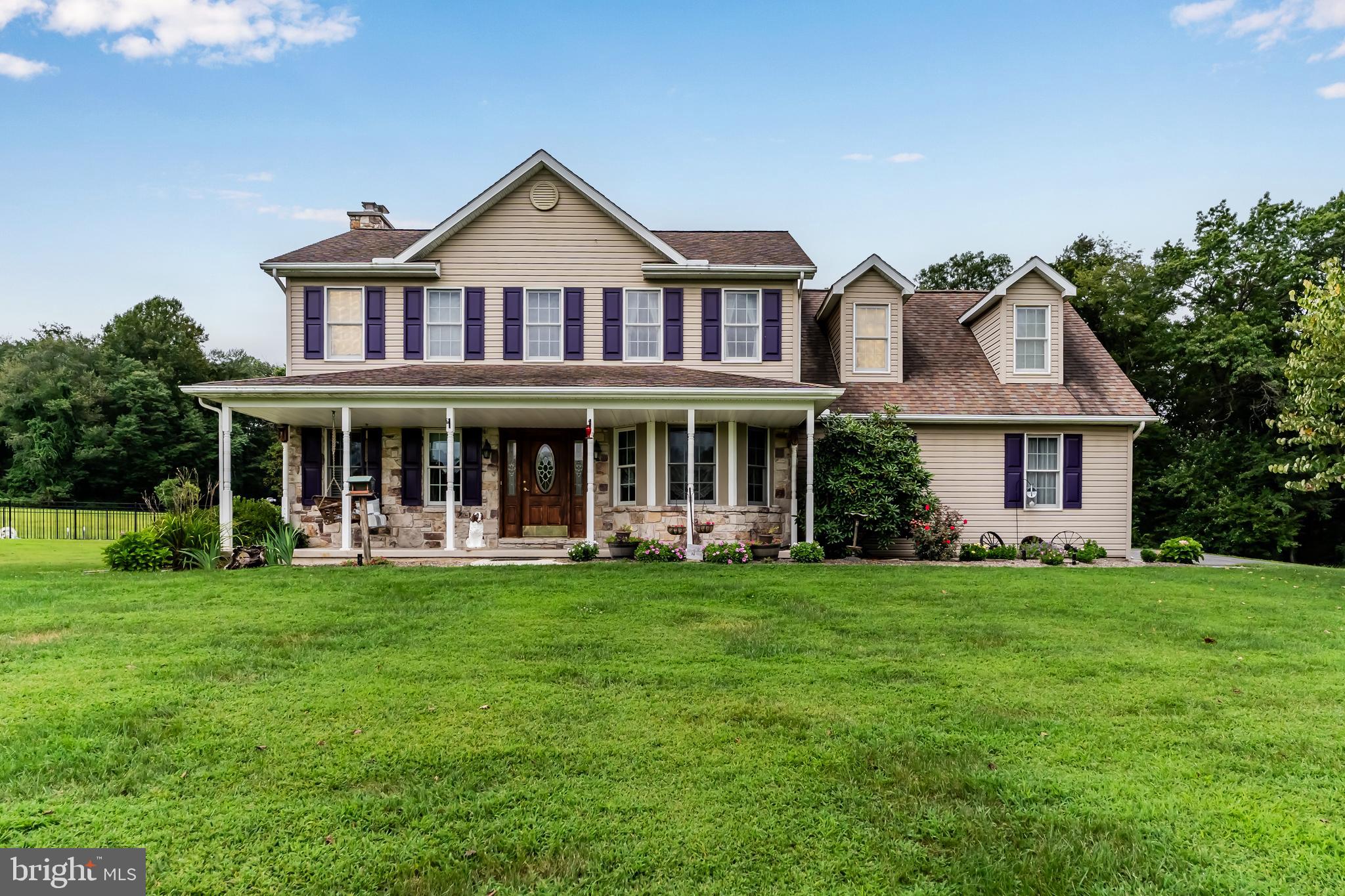 392 Peach Glen Road Gardners, PA 17324 - Photo 17 of 72 a front view of a house with a garden