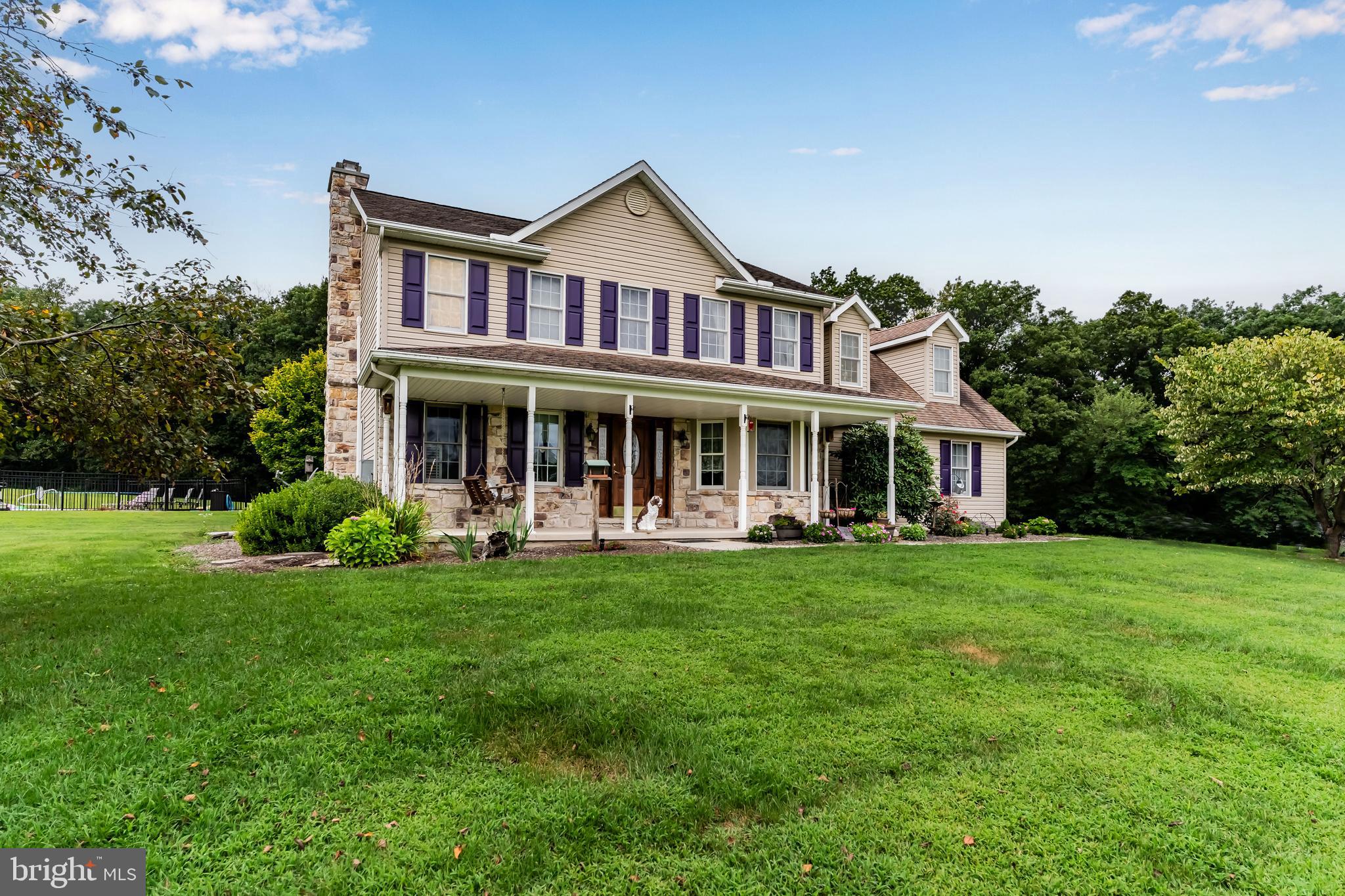 392 Peach Glen Road Gardners, PA 17324 - Photo 18 of 72 a front view of a house with a garden